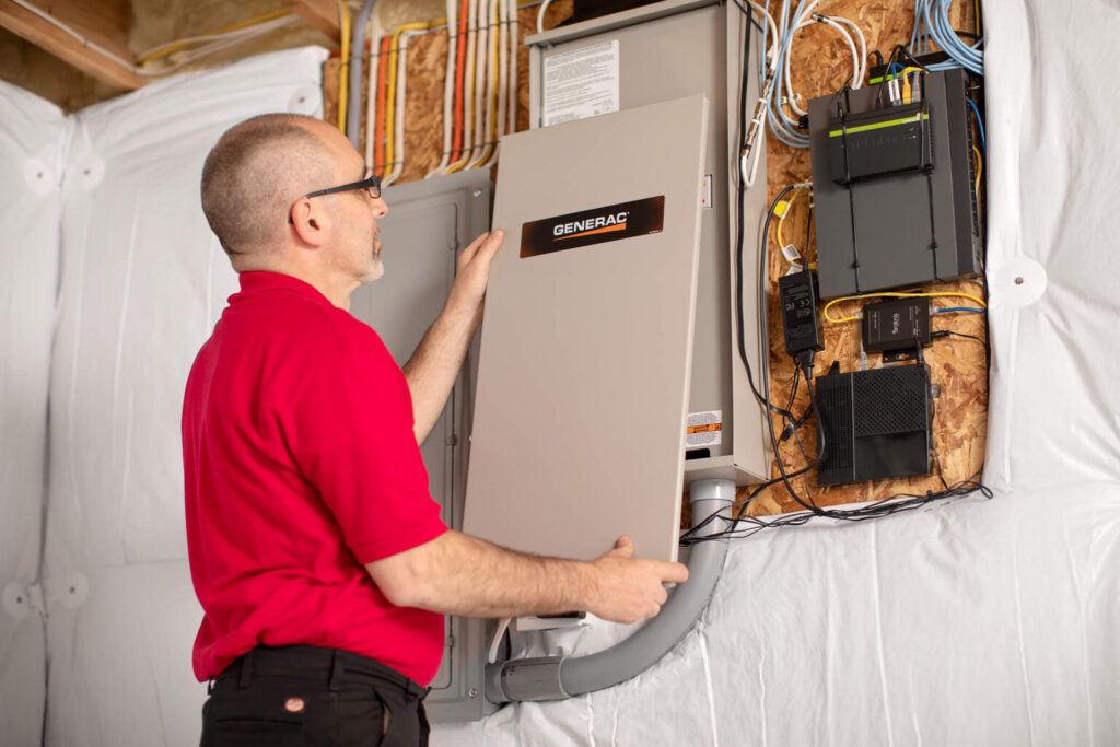 Isaac tehcnicain installing a new Generac generator in a Buffalo home