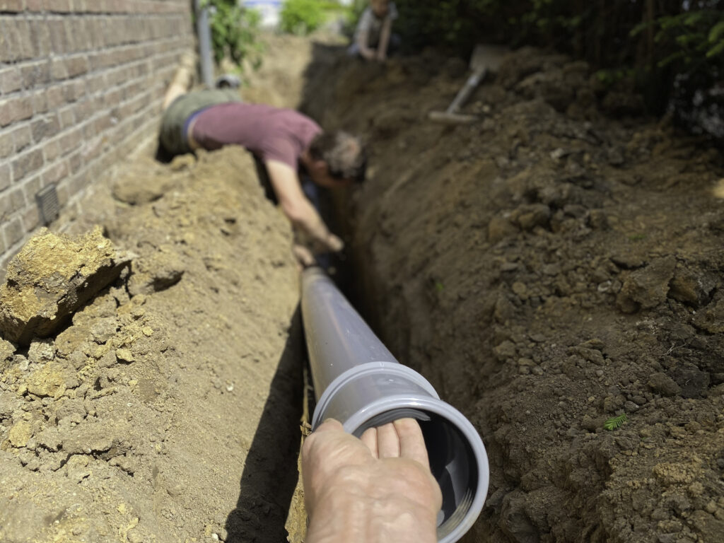 New sewer line being installed at a residence