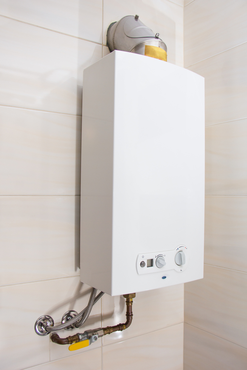 Gas tankless water heater in bathroom