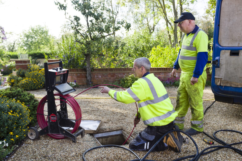 A drain cleaning company checks a blocked drain with a camera prior to jetting