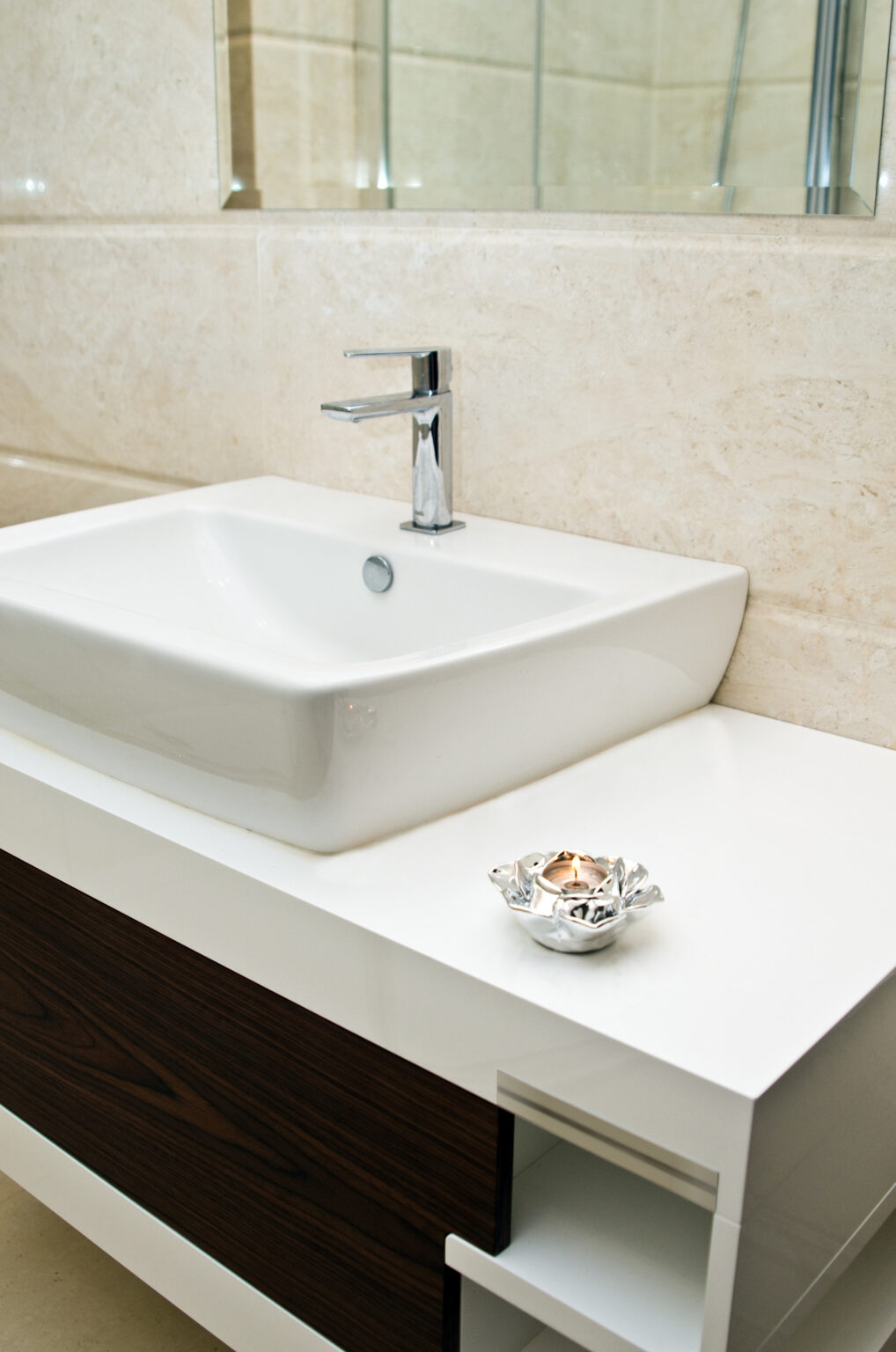 Elegant white ceramic modern bathroom sink with chrome faucet