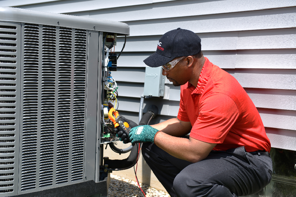 AC service being completed by an Isaac professional