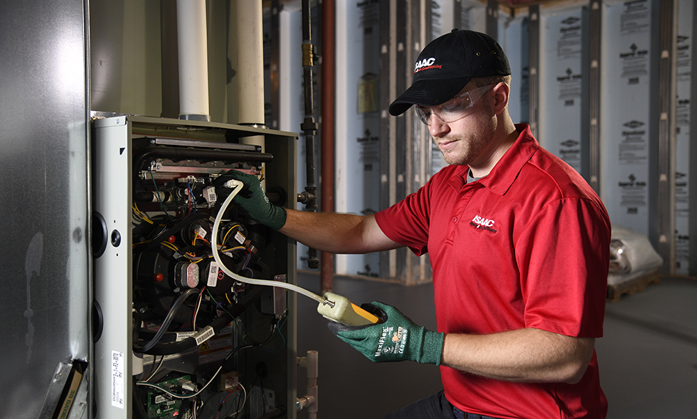 Isaac technician performing a heating repair