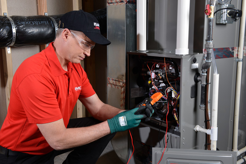 Isaac technician installing a new heating system